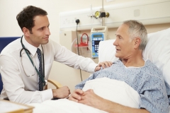 Doctor by Patient's Beside - 42402717_ml